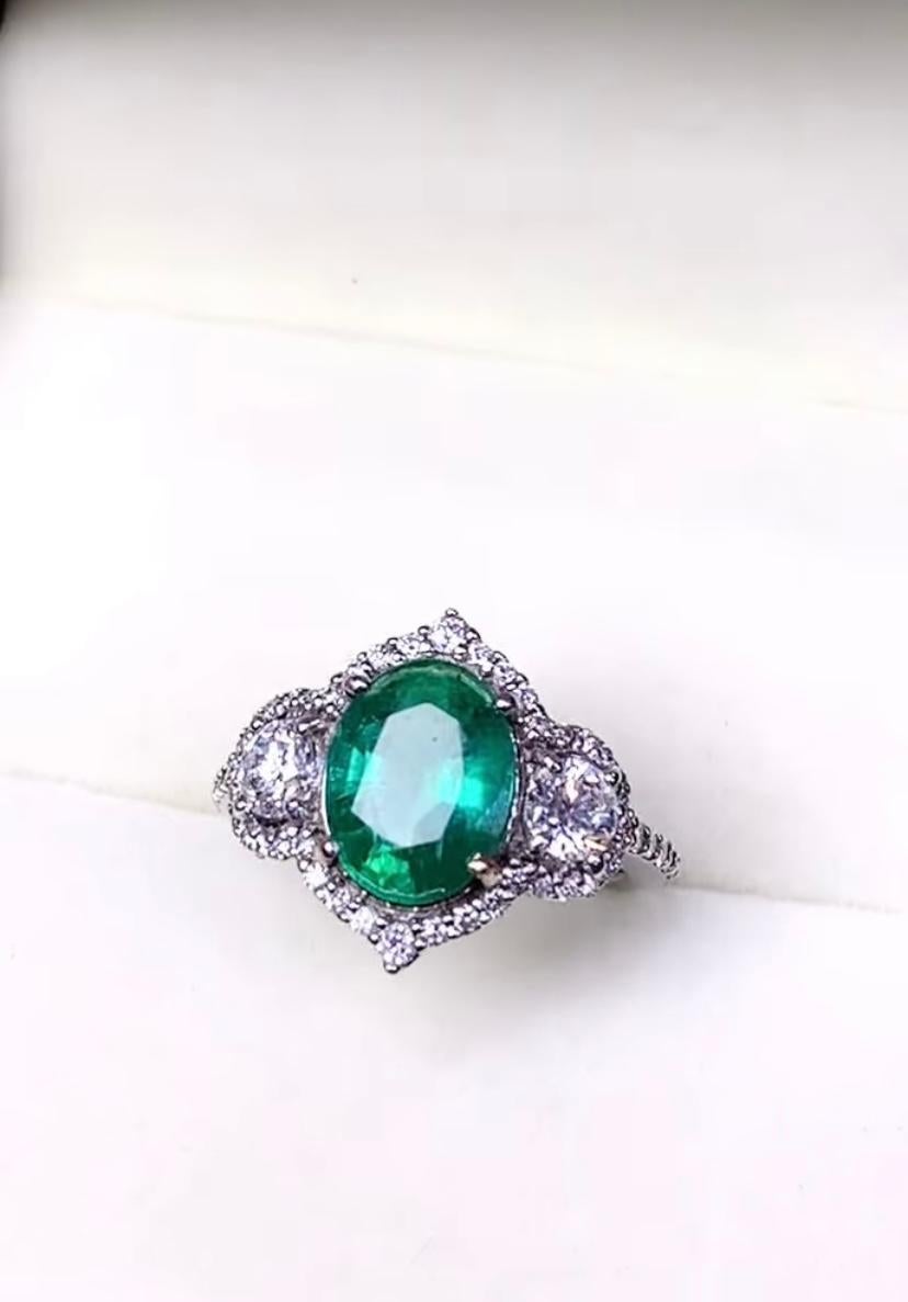 AIG Certified 2.82 Ct Zambian Emerald 1.00 Ct Diamonds 18k Gold Ring For Sale 3