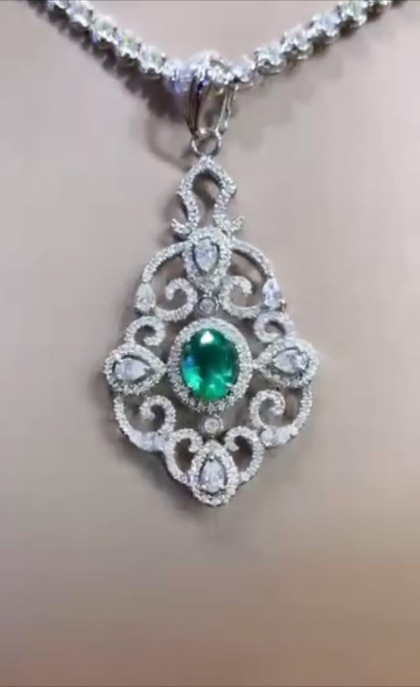 Simply classic. A timeless piece of emerald and diamonds pendant.
The vibrant green emerald is complemented by the sparkly of the surrounding diamonds, creating a mesmerizing and luxurious piece of jewelry that is sure to turn heads wherever it is