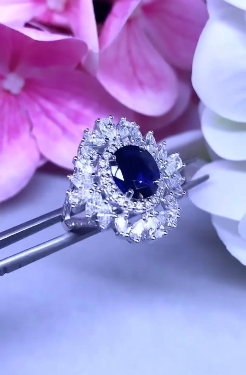 Oval Cut AIG certified 3.00 Carats Royal Blue Ceylon Sapphire 2.30 Ct Diamonds Ring For Sale