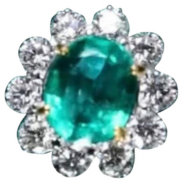 Anello in oro 18K con smeraldo dello Zambia certificato AIG da 3,00 carati e 2,00 carati di diamanti