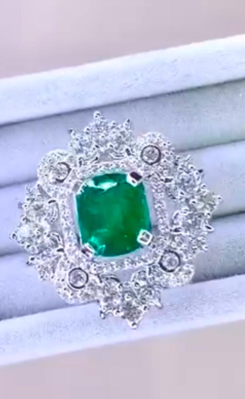 A celebration of Radiance!
This stunning ring feature a Zambian Emerald of 3,00 carats, in spectacular vibrant color, framed by 106 dazzling diamonds weighting 2,40 carats, F-G color VS clarity, very sparkly.
An exquisite harmony of vibrant green