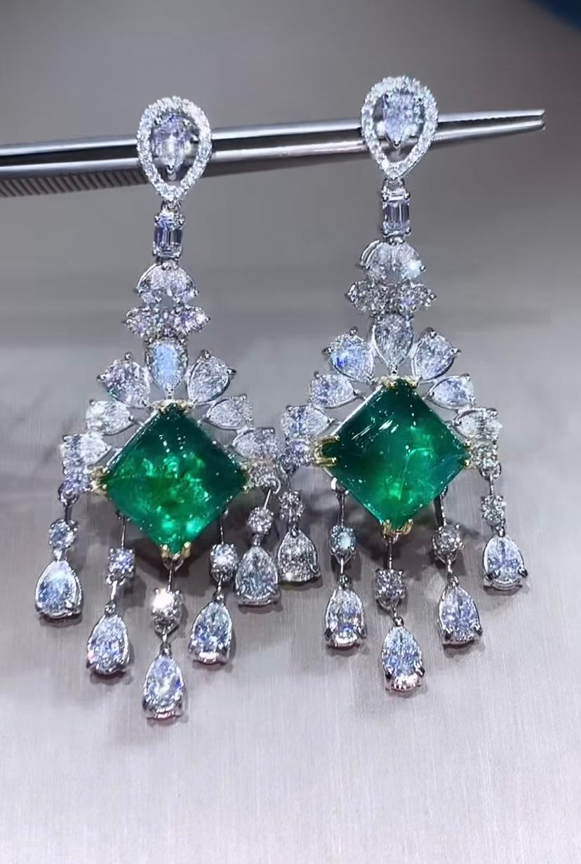 A master piece, so gorgeous, impressive design,  by Italian designer, a very piece of art.
Piece of high jewelry. The style is sophisticated,  glamour, ideal for fashionable ladies.
Earrings come in 18k gold with 2 pieces of  Natural Zambian