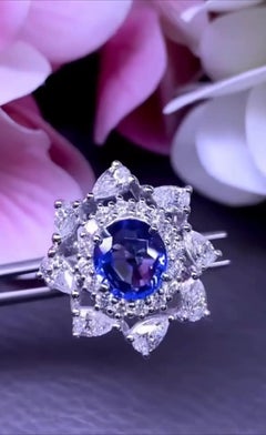 AIG Certified 3.05 Carats Ceylon Sapphire.  2.82 Ct Diamonds 18k Gold Ring
