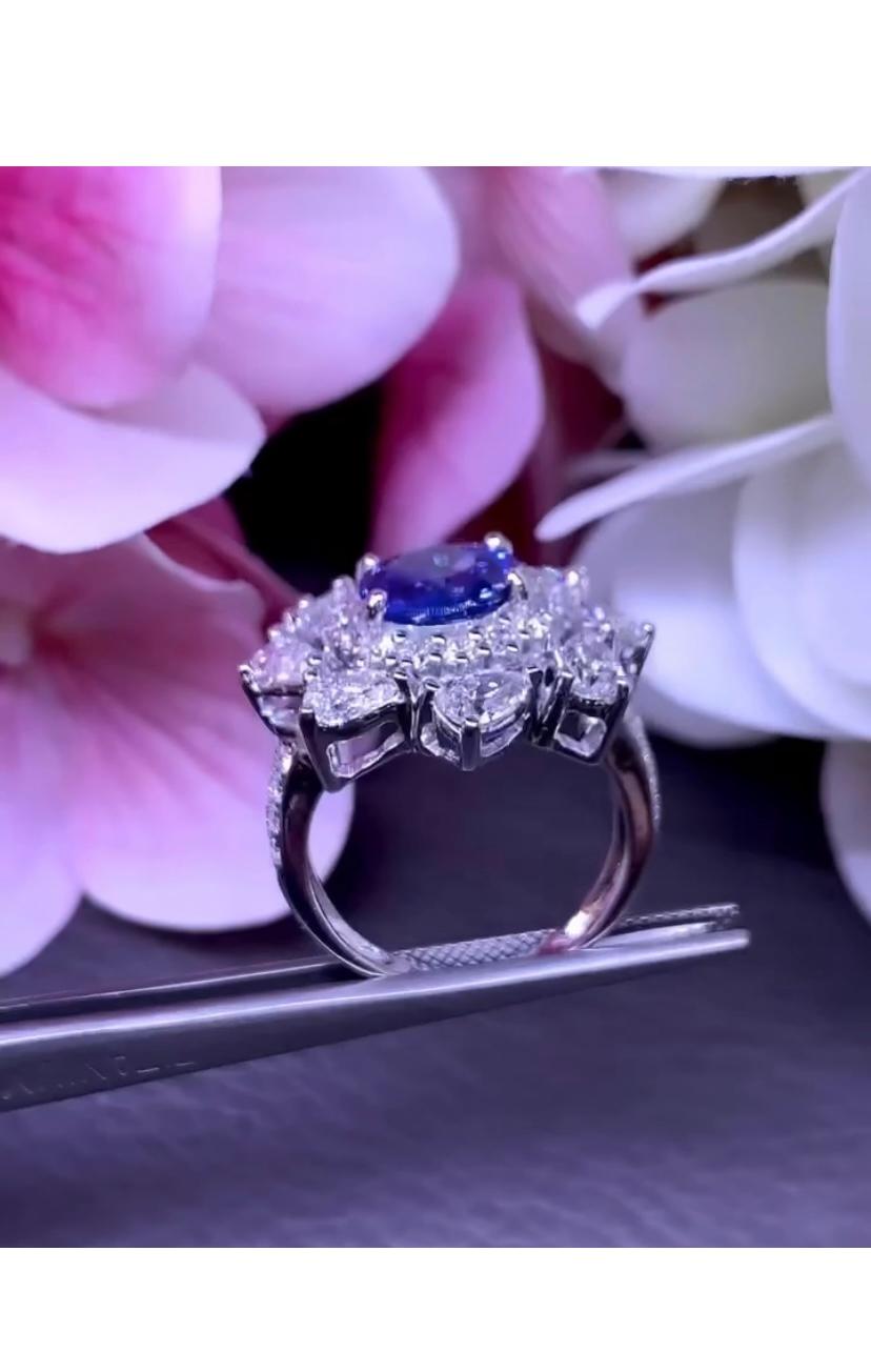 Oval Cut AIG Certified 3.05 Carats Ceylon Sapphire.  2.82 Ct Diamonds 18k Gold Ring For Sale
