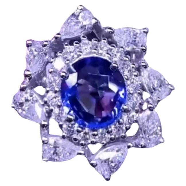 AIG Certified 3.05 Carats Ceylon Sapphire.  2.82 Ct Diamonds 18k Gold Ring