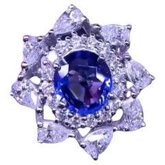 AIG Certified 3.05 Carats Ceylon Sapphire.  2.82 Ct Diamonds 18k Gold Ring