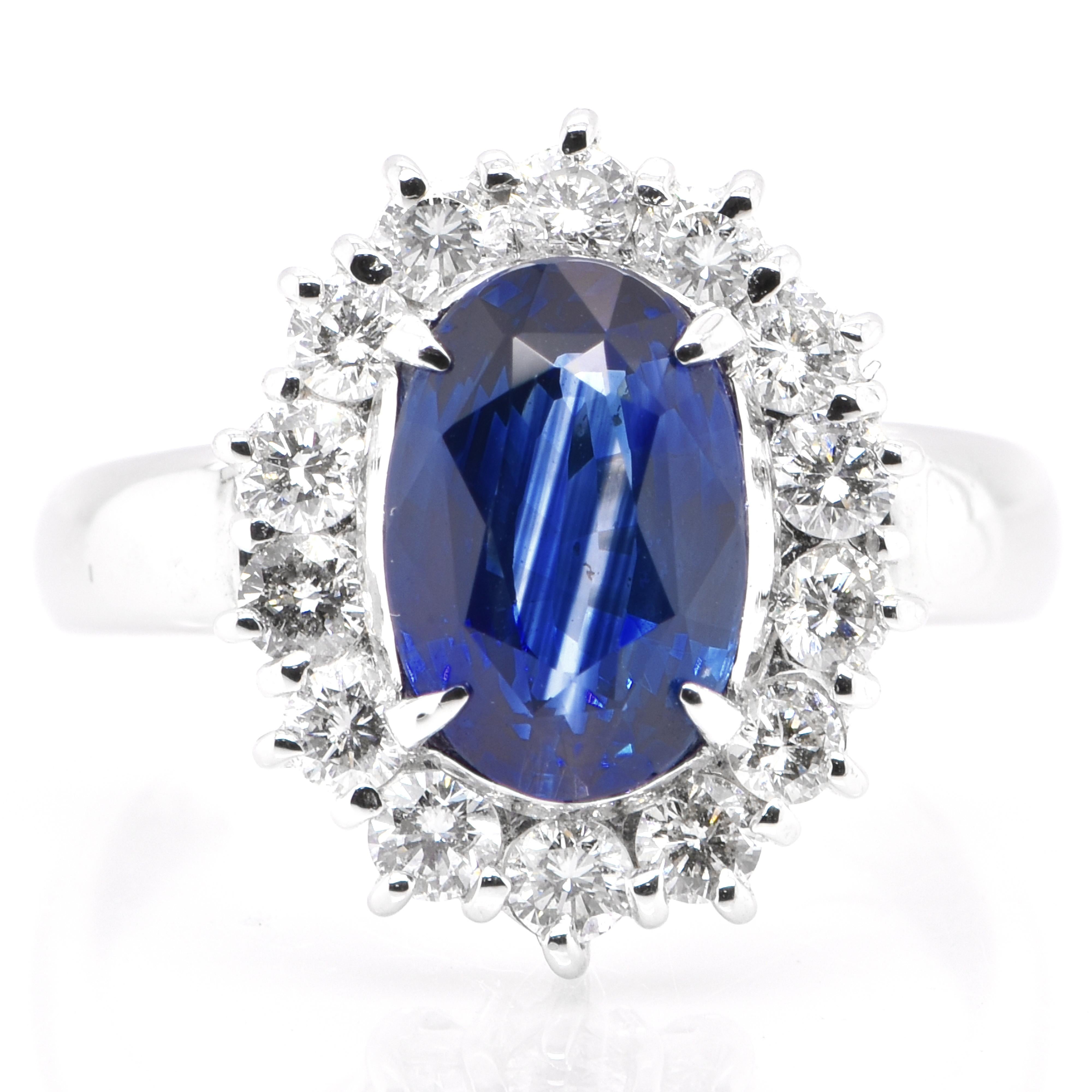 A beautiful Cocktail ring featuring a AIGS Certified 3.11 Carat Natural Unheated/Untreated Cornflower Blue Sapphire and 0.83 Carats Diamond Accents set in Platinum. Sapphires have extraordinary durability - they excel in hardness as well as