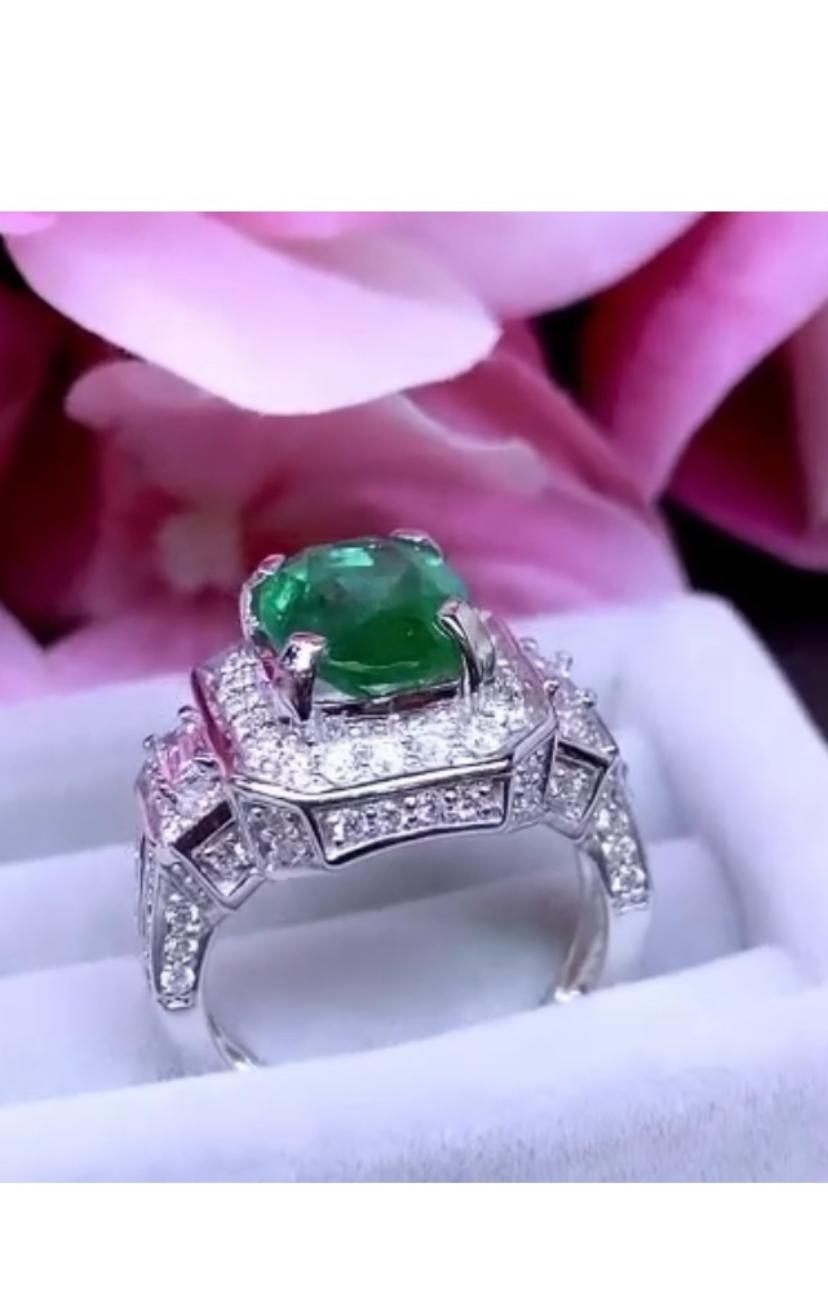 Oval Cut AIG Certified 3.20 Carats Zambian Emerald  1.20 Ct Diamonds 18K Gold Ring  For Sale