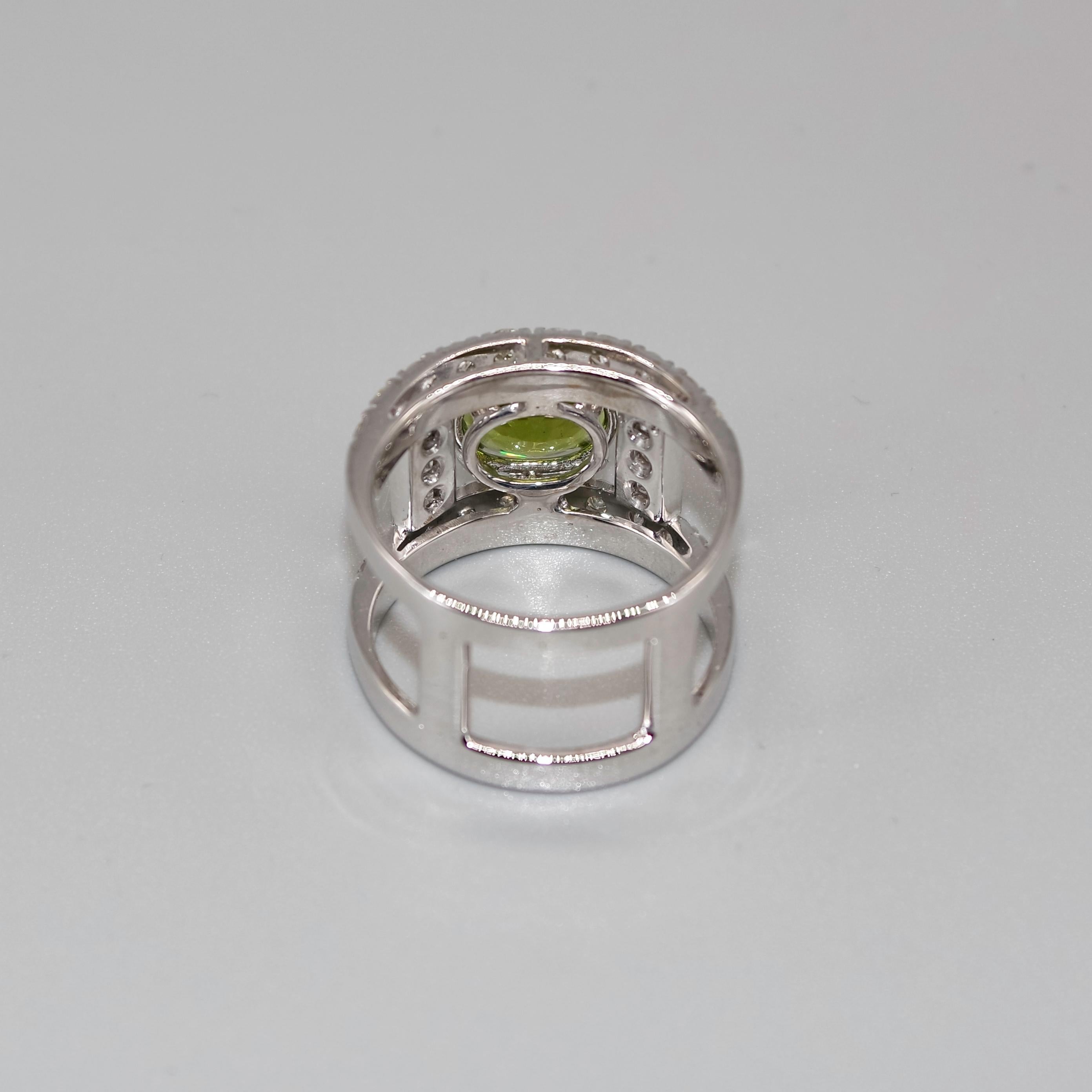 Modern AIG Certified 3.69 Carat Oval Peridot and 1.98 Carat Diamond Cocktail Ring For Sale