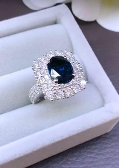 AIG Certified 3.80 Ct Blue Ceylon Sapphire 2.15 Ct Diamonds 18K Gold Ring