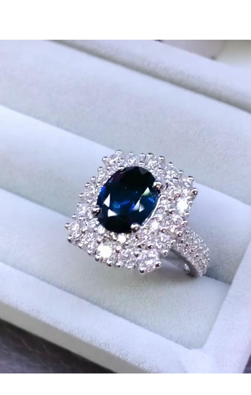 Oval Cut AIG Certified 3.80 Ct Blue Ceylon Sapphire 2.15 Ct Diamonds 18K Gold Ring For Sale