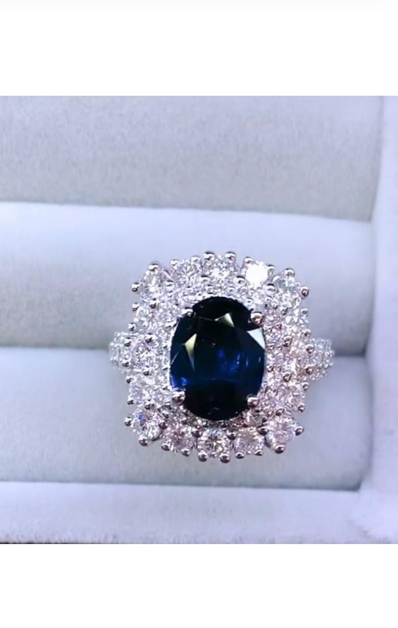 Women's AIG Certified 3.80 Ct Blue Ceylon Sapphire 2.15 Ct Diamonds 18K Gold Ring For Sale