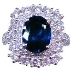 18 Karat Goldring mit AIG-zertifiziertem 3,80 Karat blauem Ceylon-Saphir und 2,15 Karat Diamanten