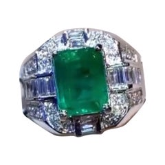 Émeraude de Zambie certifiée AIG de 3,89 carats  1.28 Ct Diamants Or 18K  Bague