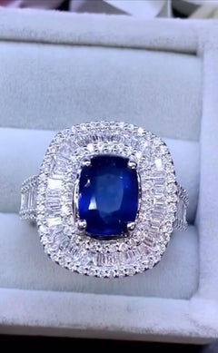 18 Karat Goldring mit AIG-zertifiziertem 3,90 Karat Ceylon-Saphir und 2,30 Karat Diamanten