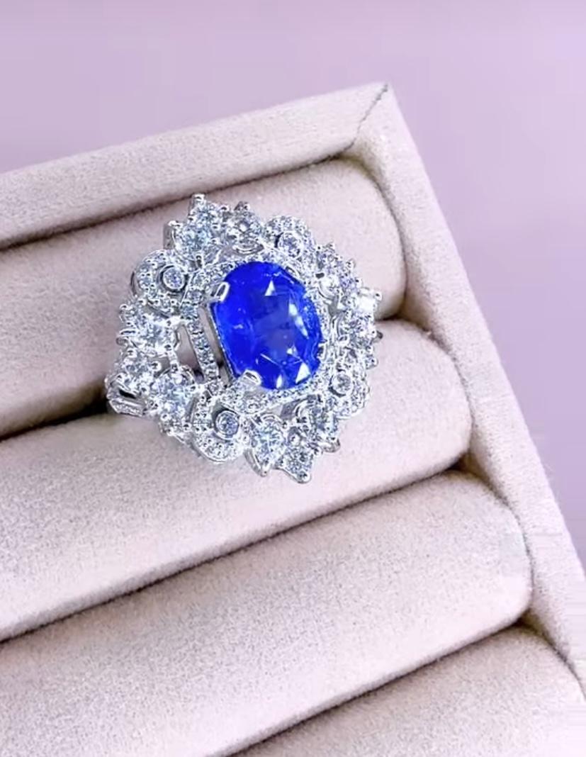 18 Karat Goldring mit AIG-zertifiziertem 4,00 Karat Ceylon-Saphir und 2,40 Karat Diamanten im Angebot 1