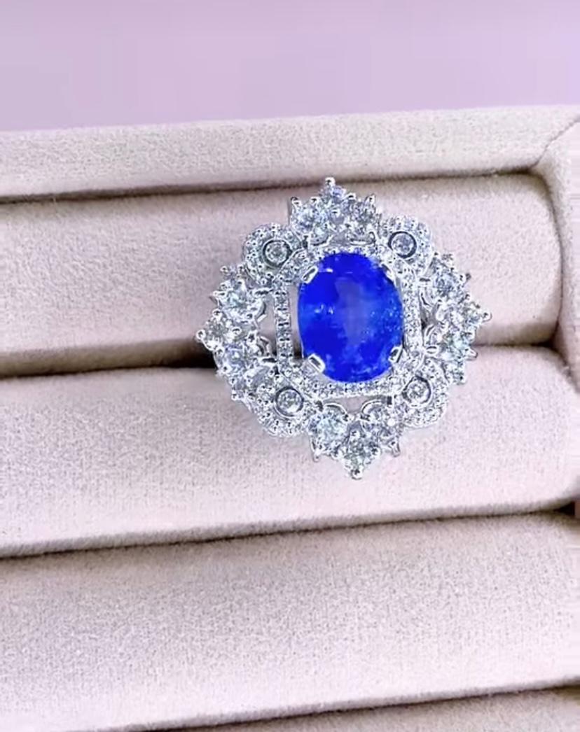 18 Karat Goldring mit AIG-zertifiziertem 4,00 Karat Ceylon-Saphir und 2,40 Karat Diamanten im Angebot 3