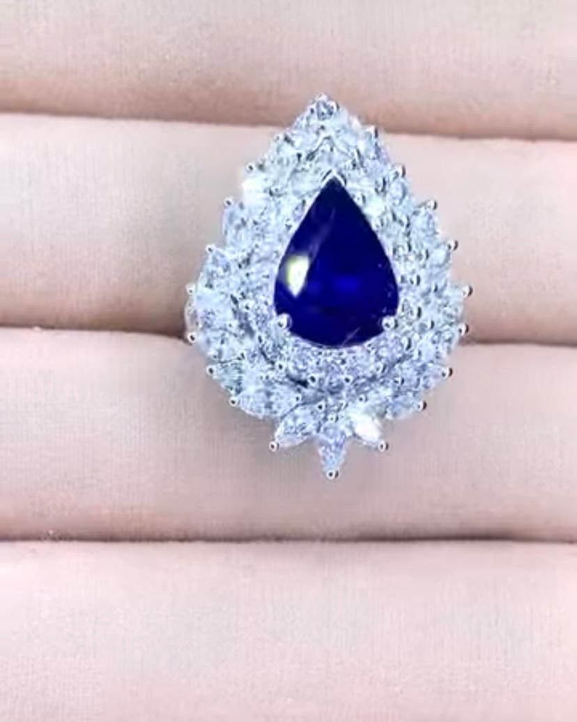 AIG Certified 4.00 Ct Blue Royal Ceylon Sapphire 2.40 Ct Diamonds 18K Gold Ring For Sale 6