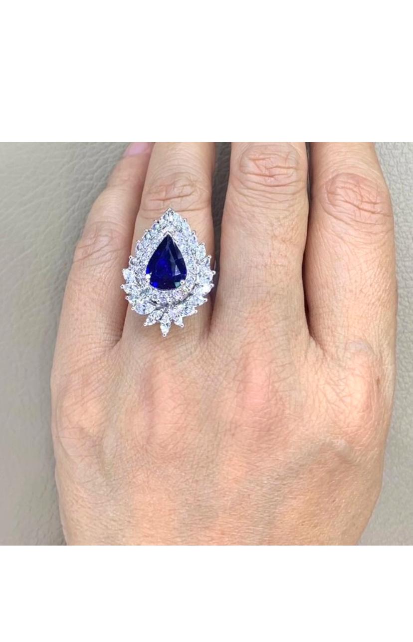 AIG Certified 4.00 Ct Blue Royal Ceylon Sapphire 2.40 Ct Diamonds 18K Gold Ring For Sale 8