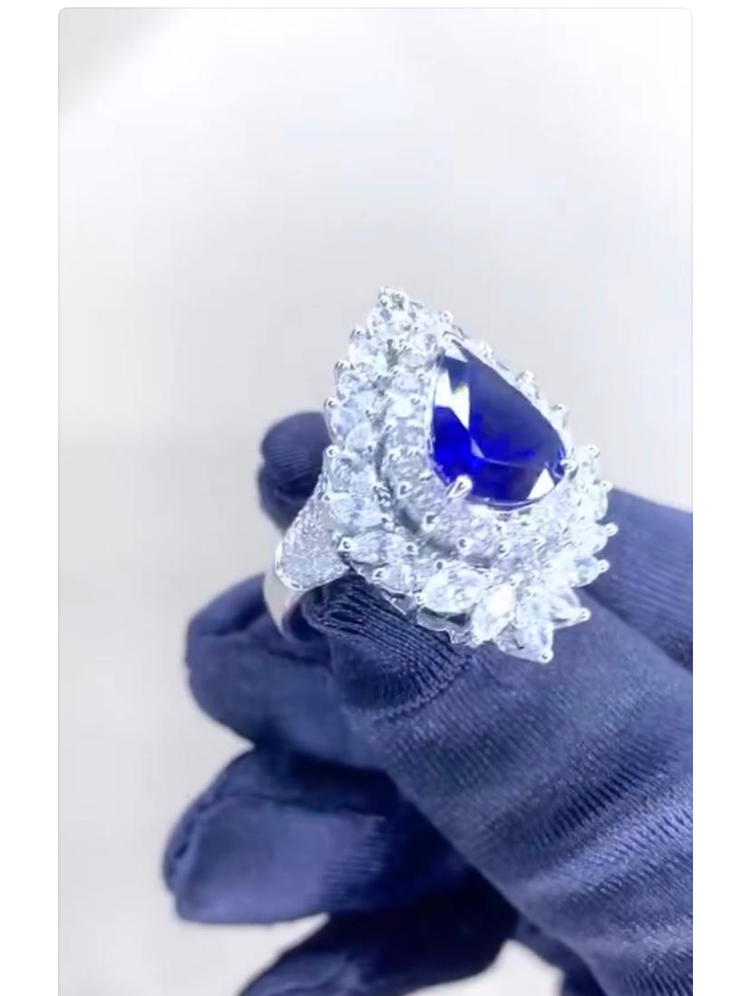 Pear Cut AIG Certified 4.00 Ct Blue Royal Ceylon Sapphire 2.40 Ct Diamonds 18K Gold Ring For Sale