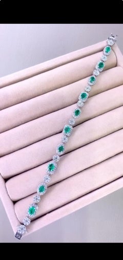 AIG Certified 4.00 Ct Zambian Emerald 3.00 Ct Diamonds 18K Gold Ring