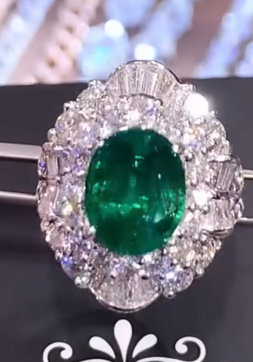 18 Karat Goldring, AIG-zertifizierter 4,00 Karat sambischer Smaragd 3,30 Karat Diamanten (Ovalschliff) im Angebot