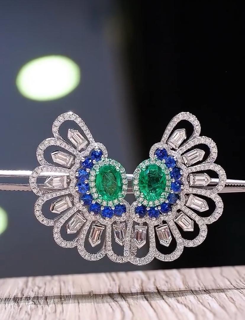An exquisite Emeralds, Diamonds and Sapphires earrings in an  original and particular design, designed and crafted with meticulous attention on all details.
Add a touch of colors and glamour on your outfit , and elevate your timeless of beauty with