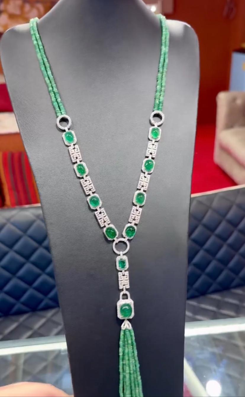 An exquisite necklace in Art Deco design, so refined, particular, a very adorable style.
Necklace come in 18K gold with emeralds beads , and 40 pieces of Natural Zambian Emeralds, extra fine quality, spectacular color , in perfect cabochon oval cut