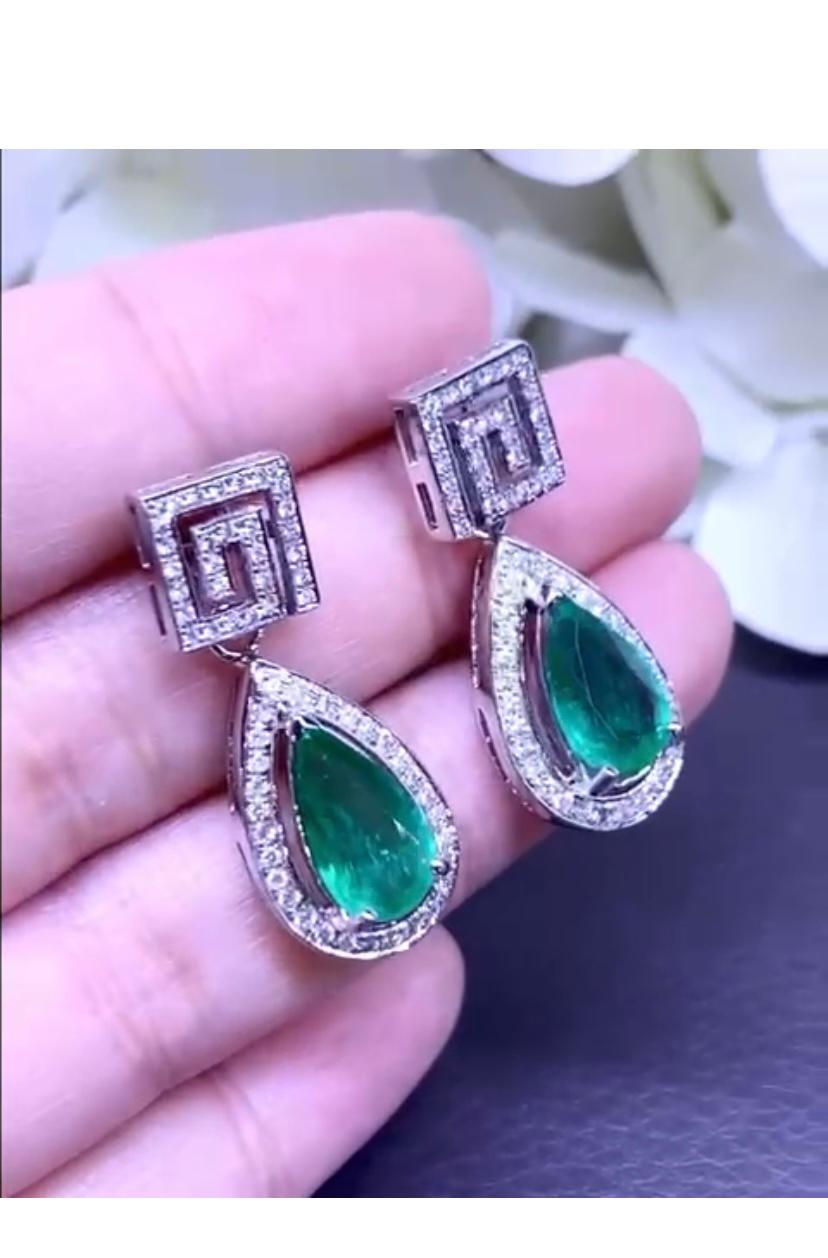 Pear Cut AIG Certified 4.07 Carats ZambianEmeralds Diamonds 1.37 Gold Earrings For Sale