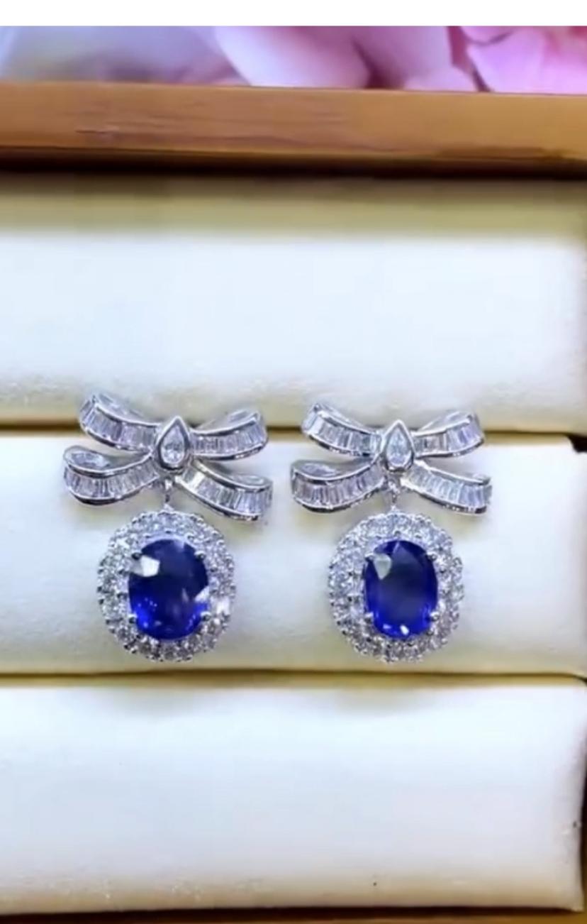 An enchanting essence of a magnificent pair of earrings. This radiant creation is bedecked with a splendid array of glistering diamonds and vibrant sapphires.
Adorned with a two pieces of captivating Blue Ceylon Sapphires, this unparalleled