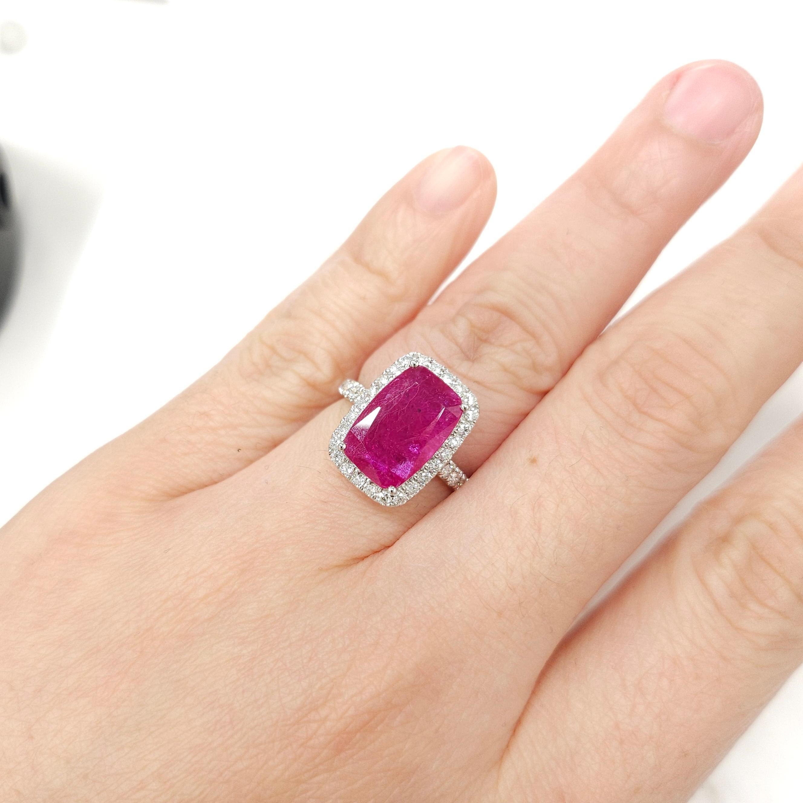 Introducing a true masterpiece of luxury and rarity, the AIG Certified 4.30 Carat Intense Red Unheated Natural Ruby from Burma Ring showcases unparalleled beauty and exceptional craftsmanship. This exquisite ring features a remarkable 4.30 carat