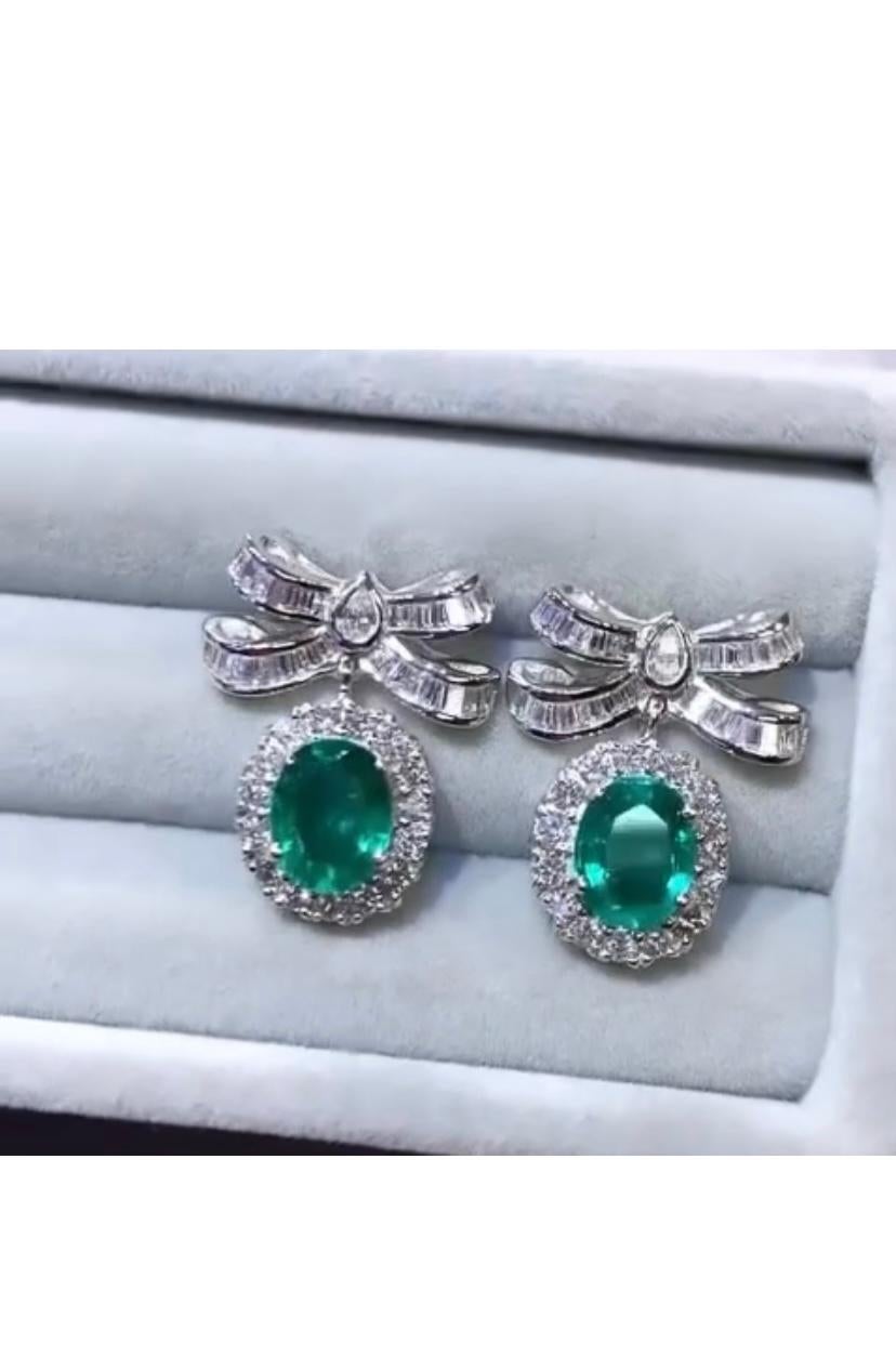 Oval Cut AIG Certified 4.30 Carats Zambian Emeralds  2.20 Ct Diamonds 18K Gold Earrings  For Sale