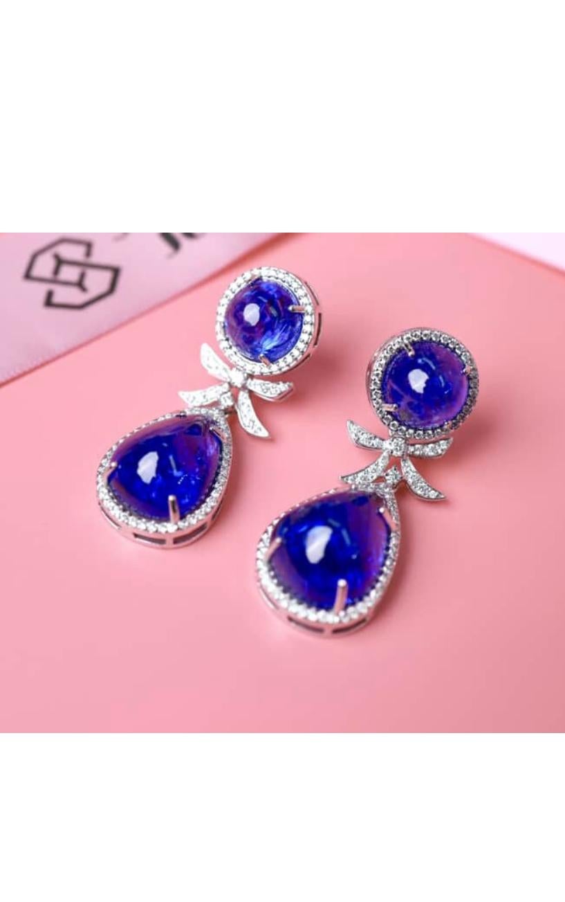 Mixed Cut AIG Certified 43.70 Carats Tanzanites 1.30 Carats Diamonds 18K Gold Earrings For Sale