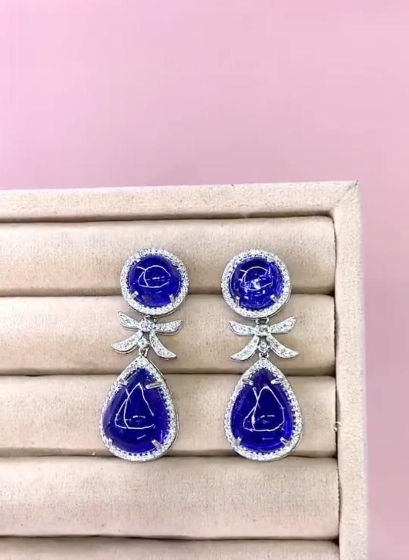 Women's AIG Certified 43.70 Carats Tanzanites 1.30 Carats Diamonds 18K Gold Earrings For Sale