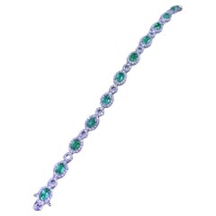 Emeraudes zambiennes certifiées AIG de 4.40 carats  Diamants 3,47 carats  Bracelet en or 18K 