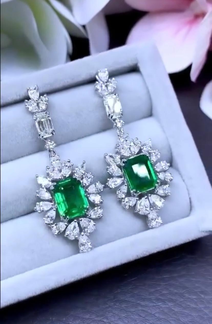 Emerald Cut AIG Certified 4.50 Carats Diamonds. 3.64 Ct Zambian Emeralds 18K Gold Earrings  For Sale