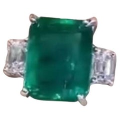 Esmeralda de Zambia de 5,00 quilates certificada por AIG Anillo de diamantes de 0,80 quilates certificado por GIA