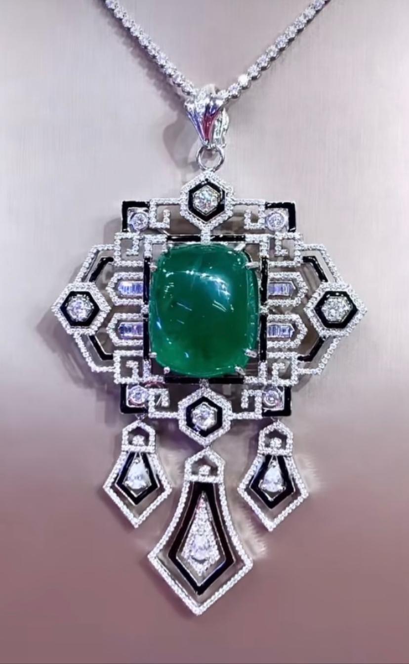 From Art Deco collection, pendant/brooch realized exclusively handmade. A very adorable and refined style. It is a piece of high jewelry.
Pendant/brooch come in 18k gold with a natural Zambian emerald , cabochon cut, fine quality, spectacular color