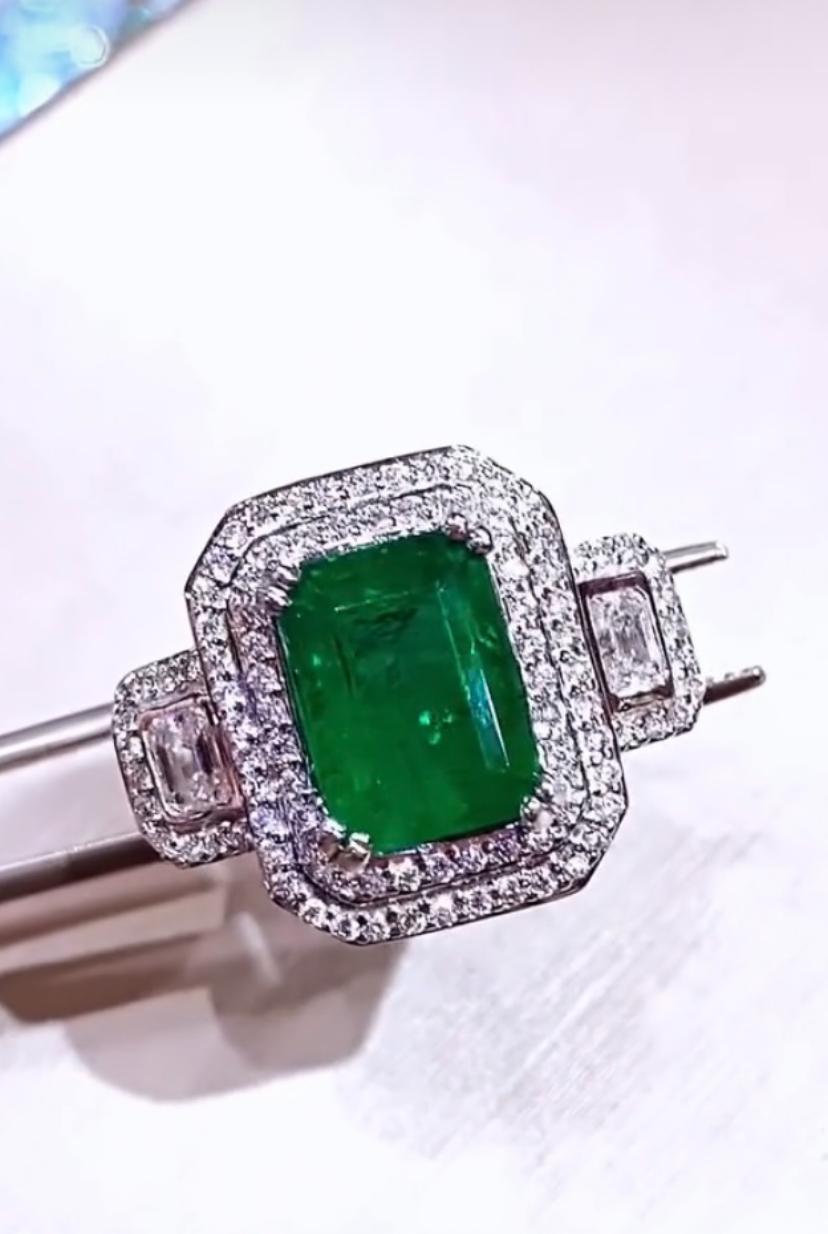 An exclusive ring in Art Decó design, so glamour and sophisticated style , a very piece of art .
Elevate your look and adds a touch of class and charm. 
Magnificent ring come in 18k gold with a Natural Zambian Emerald, fine quality , spectacular