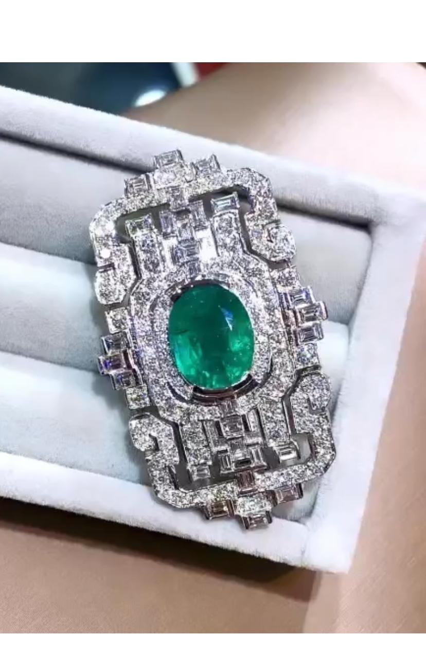 Oval Cut AIG Certified 5.40 Carat Zambian Emerald  3.70 Ct Diamonds 18k Gold Brooch  For Sale