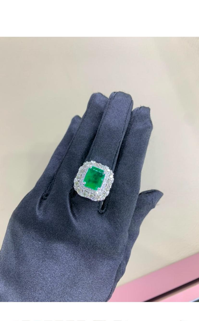 Emerald Cut AIG Certified 5.50 Carat Zambian Emerald 2.00 Ct Diamonds 18k Gold Ring For Sale