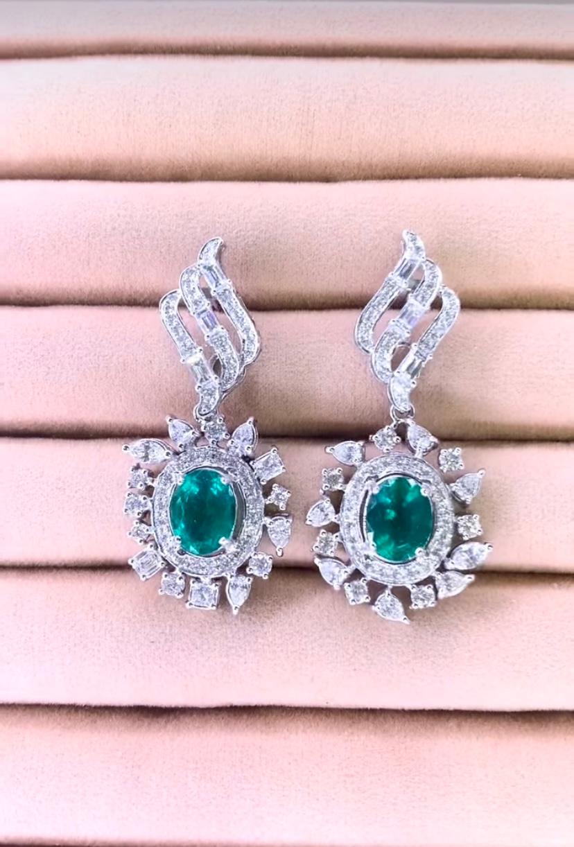 Oval Cut AIG Certified 5.50 Carat Zambian Emeralds 4.80 Ct Diamonds 18K Gold Earrings For Sale