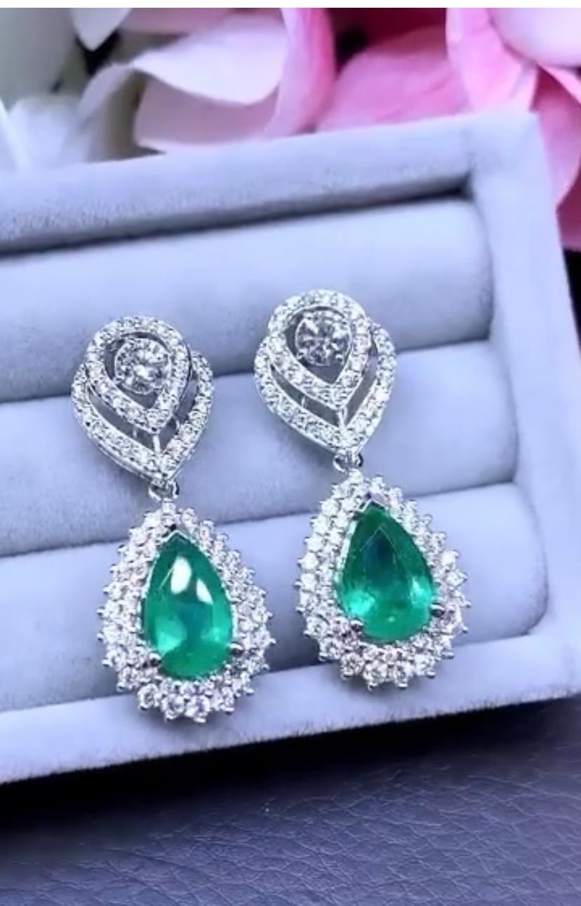 An exclusive pair of earrings in contemporary design, so particular and refined, by Italian designer, perfect for glamour ladies.
Earrings come in 18K gold with 2 pieces of natural Zambian Emeralds , in ideal pear cut, fine quality, adorable green,