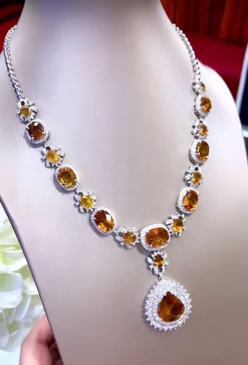 A gorgeous necklace in flowers design , so most beautiful style, perfect for glamour party and events. 
Necklace come in 18k gold with 17 pieces of natural orange Sapphires, in oval and pear cut , spectacular color and extra fine grade and quality,