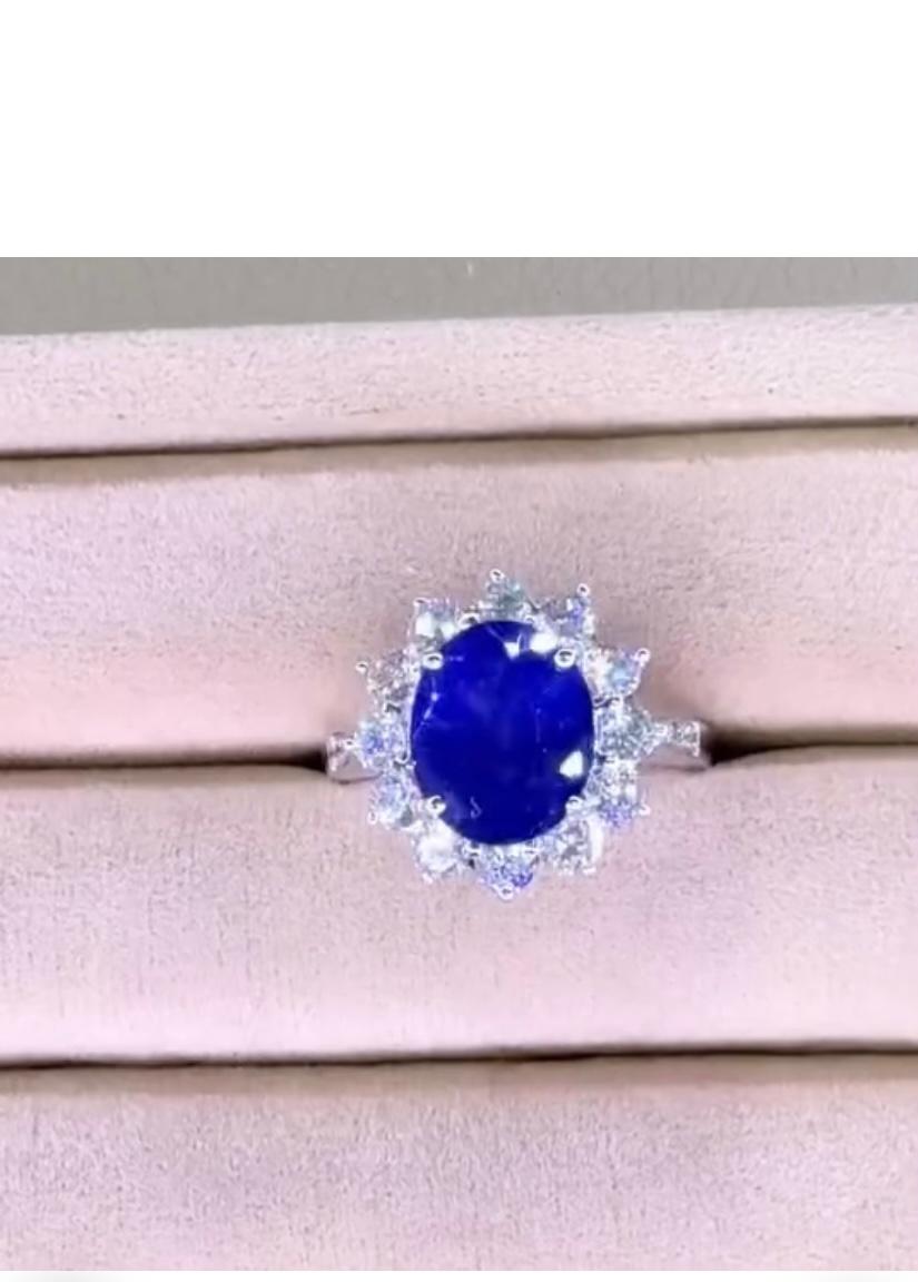 Bague en or 18 carats avec saphir bleu de Ceylan certifié AIG de 5,80 carats et diamants de 1,30 carat Pour femmes en vente