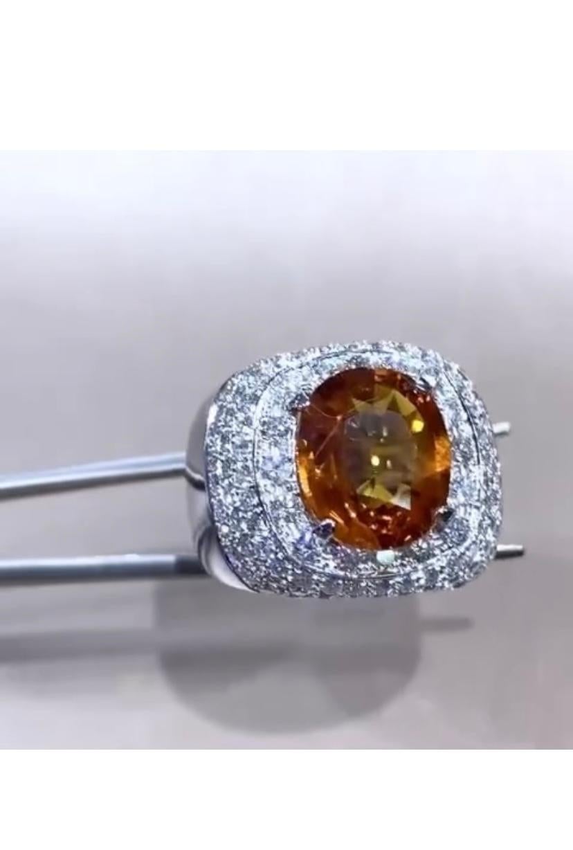 Oval Cut AIG Certified 5.80 Carat Orange Sapphire  1.90 Ct Diamonds 18K Gold Ring For Sale