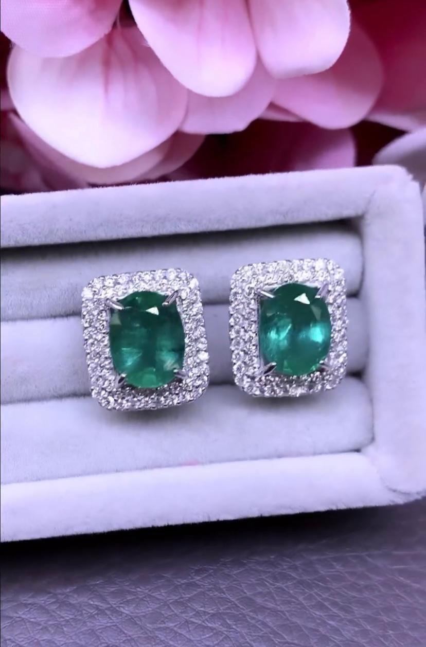 Oval Cut AIG Certified 5.80 Carats Zambian Emeralds  1.13 Ct Diamonds 18K Gold Earrings  For Sale