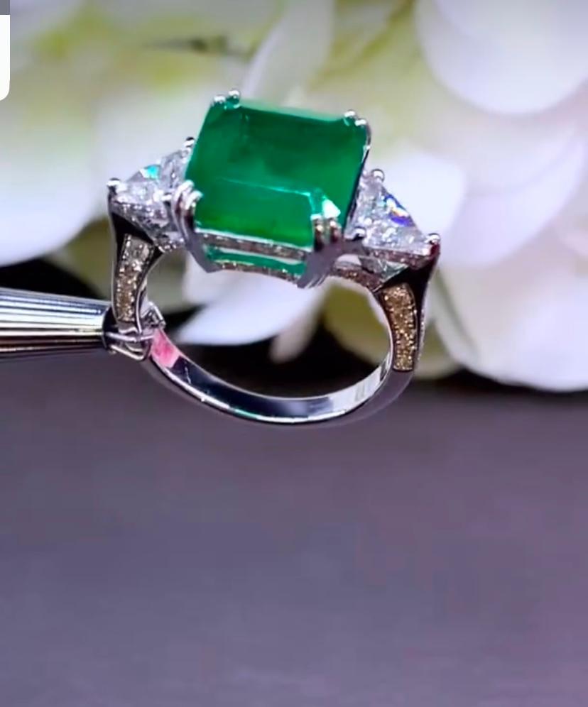 Emerald Cut AIG Certified 6.00 Carat Zambian Emerald 1.40 Ct Diamonds 18K Gold Ring For Sale