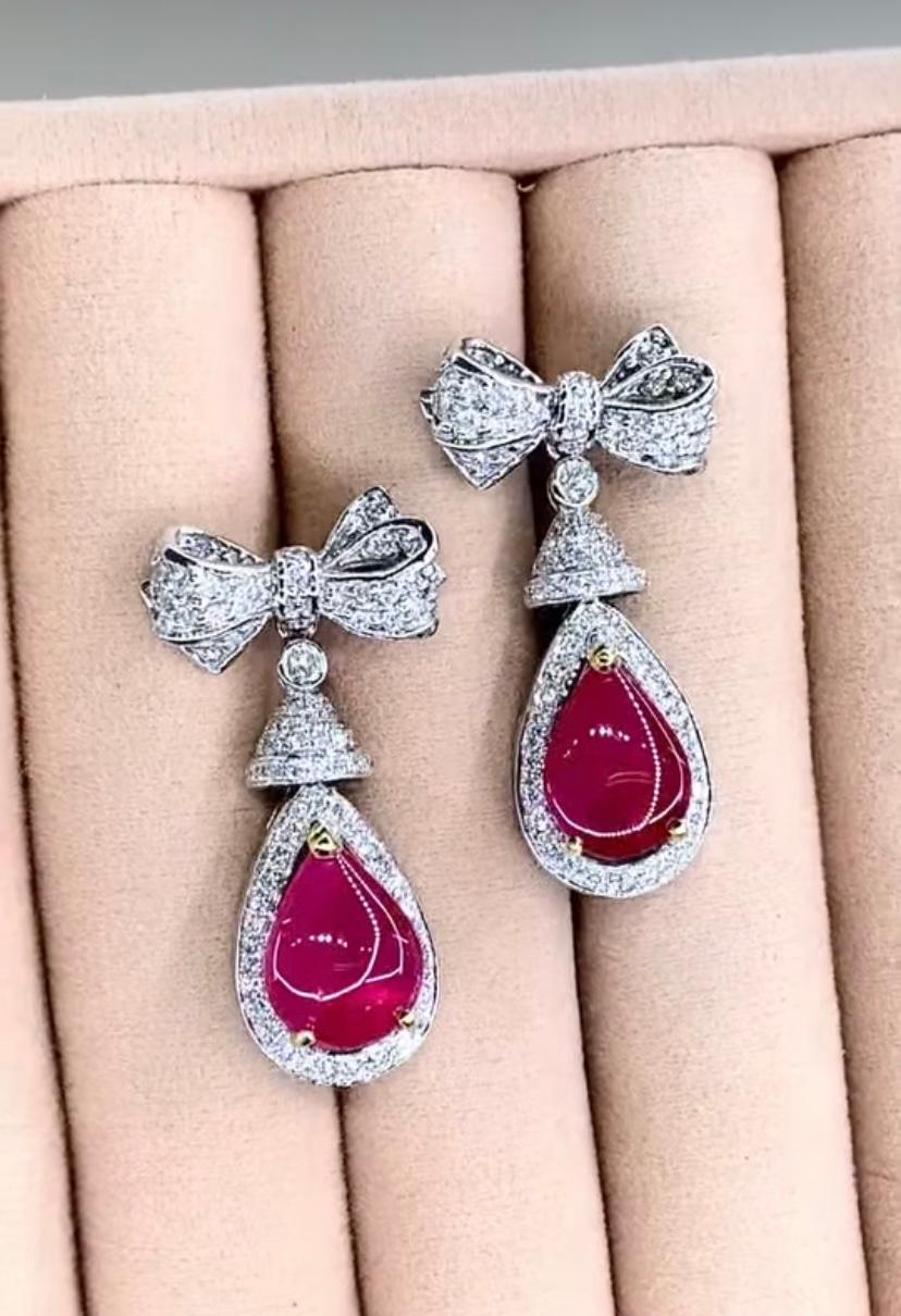 An exclusive Burma Rubies and Diamonds pair of earrings, in elegant and chic design.
Immerse yourself in the luxurious beauty of this mesmerizing piece, exuding sophistication and charm .
Stunning earrings come in 18k gold with 2 pieces of lustrous
