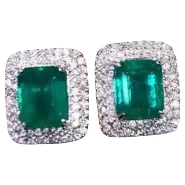 AIG Certified 6.37 Carats Zambian Emeralds  1.13 Ct Diamonds 18K Gold Earrings  For Sale